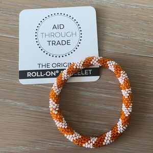 NWT - Aid Through Trade Roll-On Bracelet